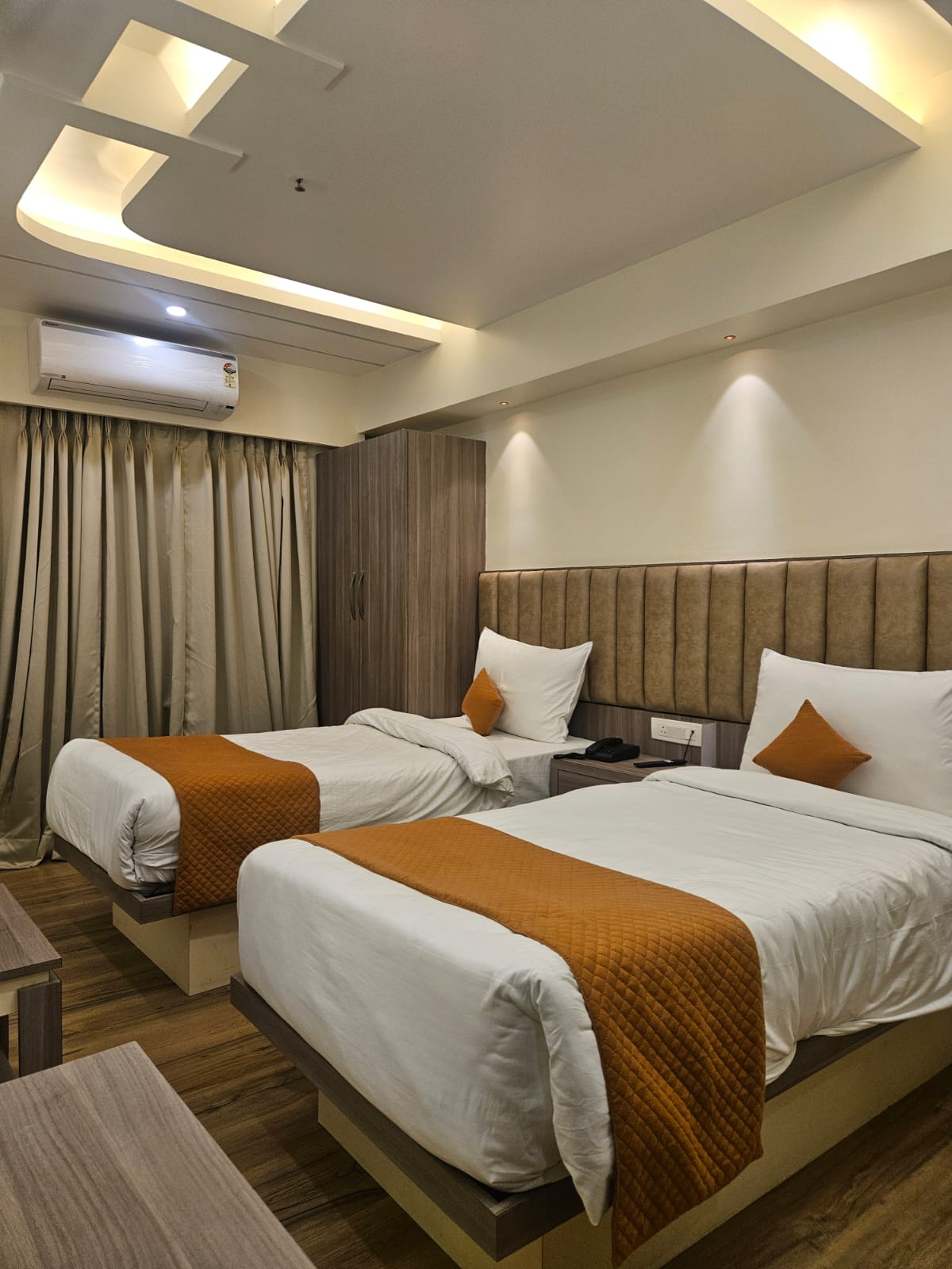 Guest room with warm bedside lighting